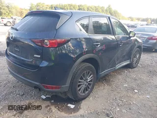 2017 Mazda CX-5 Touring with VIN JM3KFBCL6H0170455, listed as a IAAI auction lot 40381242 with 71,520 mi miles. Bid and sale history available at carsss.com. Image 4.
