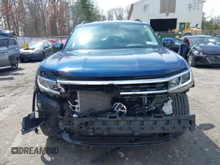 2023 Volkswagen Atlas SE with VIN 1V2HR2CA2PC505456, listed as a IAAI auction lot 42032269 with 7,918 mi miles and . Bid and sale history available at DreamBid. Image 13.