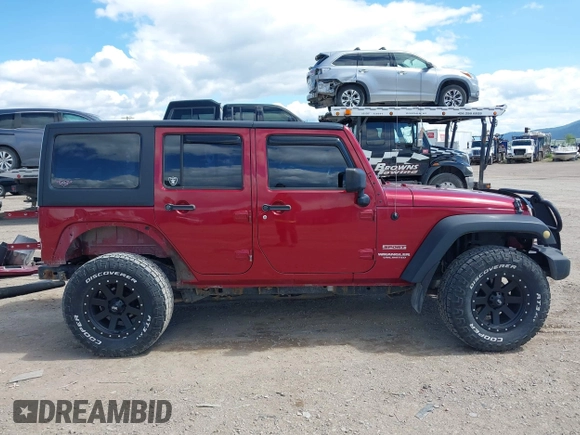 2012 Jeep Wrangler Unlimited Sport z VIN 1C4BJWDG8CL258625, wystawiony jako IAAI lot #42266102 z przebiegiem 58 594 mil mil oraz . Historia ofert i sprzedaży dostępna na DreamBid. Obrazek 14.