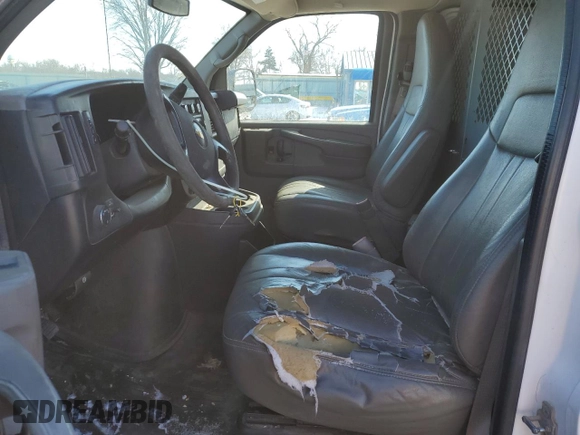 2014 Chevrolet Express Cargo Van with VIN 1GCWGGFA9E1105801, listed as a Copart auction lot 45789185 with 117,119 mi miles and Salvage Title. Bid and sale history available at carsss.com. Image 7.