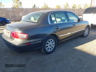 2004 Kia Amanti z VIN KNALD124645048776, wystawiony jako IAAI lot #41337748 z przebiegiem 105 447 mil mil oraz . Historia ofert i sprzedaży dostępna na DreamBid. Obrazek 4.