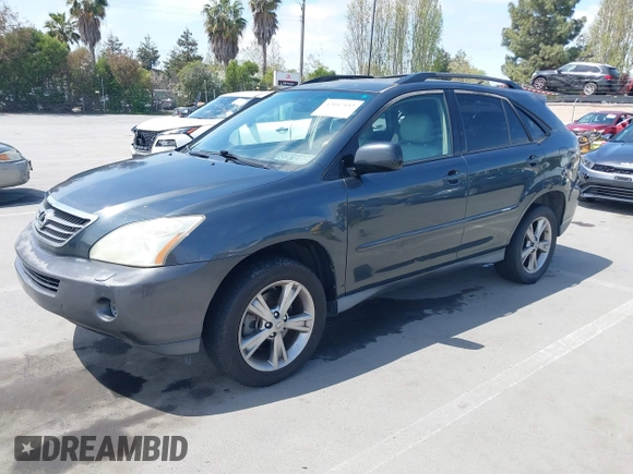 2007 Lexus RX 400h with VIN JTJGW31U372001817, listed as a IAAI auction lot 42047143 with 155,767 mi miles and . Bid and sale history available at DreamBid. Image 2.