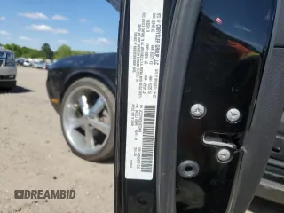 2013 Dodge Challenger SXT z VIN 2C3CDYAG6DH679449, wystawiony jako Copart lot #52784705 z przebiegiem 125 665 mil mil oraz Tytuł czysty. Historia ofert i sprzedaży dostępna na DreamBid. Obrazek 14.