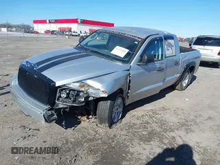 2006 Dodge Dakota SLT with VIN 1D7HE48N76S640351, listed as a IAAI auction lot 41121248 with 155,463 mi miles and . Bid and sale history available at DreamBid. Image 2.