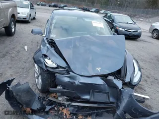 2019 Tesla Model 3 Long Range with VIN 5YJ3E1EB1KF231220, listed as a IAAI auction lot 41078766 with 28,485 mi miles. Bid and sale history available at carsss.com. Image 12.