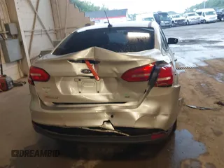 2016 Ford Focus SE z VIN 1FADP3F24GL393913, wystawiony jako IAAI lot #42640803 z przebiegiem 89 547 mil mil oraz . Historia ofert i sprzedaży dostępna na DreamBid. Obrazek 6.