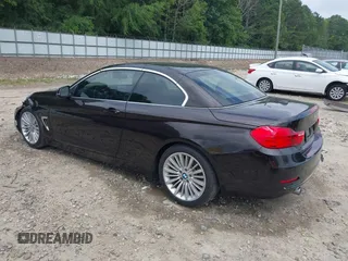 2014 BMW 4 Series 435i with VIN WBA3T3C50EJ876997, listed as a IAAI auction lot 42406299 with 115,048 mi miles and . Bid and sale history available at DreamBid. Image 3.