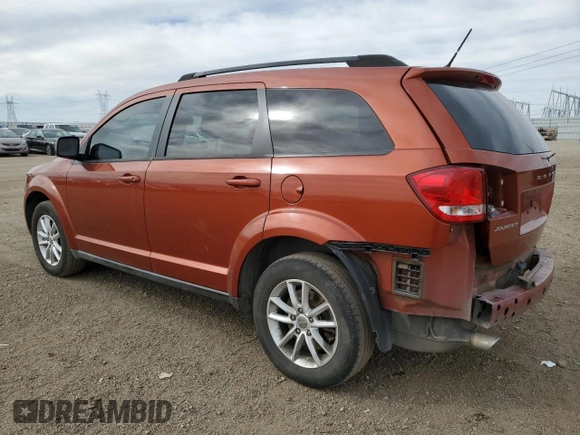 2013 Dodge Journey SXT with VIN 3C4PDCBG9DT710666, listed as a Copart auction lot 86851234 with 165,171 mi miles and Salvage title. Bid and sale history available at DreamBid. Image 2.