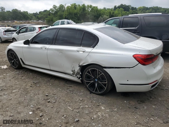 2018 BMW 7 Series 750i xDrive with VIN WBA7F2C56JB238650, listed as a Copart auction lot 64738314 with 96,889 mi miles and Salvage Title. Bid and sale history available at carsss.com. Image 2.