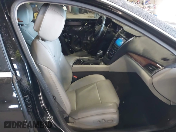 2014 Cadillac CTS Luxury AWD with VIN 1G6AX5S31E0143179, listed as a IAAI auction lot 41421639 with 135,810 mi miles and . Bid and sale history available at DreamBid. Image 5.