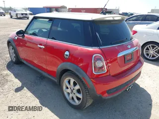 2009 MINI Hardtop S with VIN WMWMF73569TW86229, listed as a IAAI auction lot 42264383 with 63,482 mi miles and . Bid and sale history available at DreamBid. Image 3.