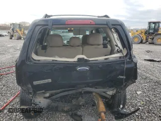 2010 Ford Escape XLT with VIN 1FMCU0DG9AKD48731, listed as a Copart auction lot 46532285 with 260,547 mi miles and Salvage Title. Bid and sale history available at carsss.com. Image 6.
