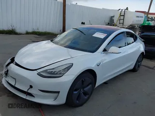 2018 Tesla Model 3 Long Range Battery with VIN 5YJ3E1EA3JF023300, listed as a IAAI auction lot 41925504 with 100,512 mi miles and . Bid and sale history available at DreamBid. Image 2.