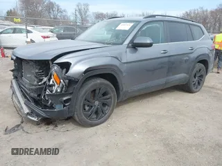 2021 Volkswagen Atlas SE z VIN 1V2KR2CA0MC570498, wystawiony jako IAAI lot #41807676 z przebiegiem 56 434 mil mil oraz . Historia ofert i sprzedaży dostępna na DreamBid. Obrazek 2.