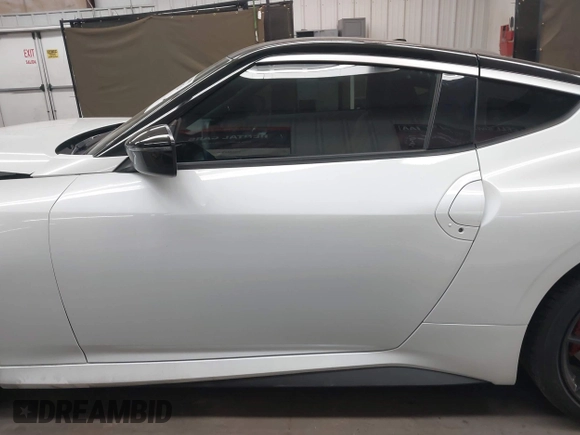 2024 Nissan Z Performance with VIN JN1BZ4BH9RM364239, listed as a IAAI auction lot 41860174 with 7,501 mi miles and . Bid and sale history available at DreamBid. Image 14.