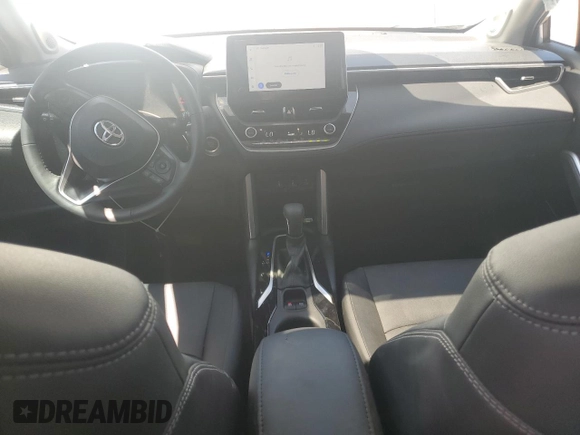 2023 Toyota Corolla Cross XLE with VIN 7MUDAAAG2PV050945, listed as a Copart auction lot 62237465 with 33,036 mi miles and Salvage title. Bid and sale history available at DreamBid. Image 8.