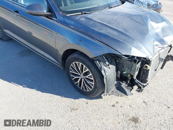 2021 Volkswagen Jetta S z VIN 3VWC57BU8MM098931, wystawiony jako IAAI lot #41818622 z przebiegiem 10 469 mil mil oraz . Historia ofert i sprzedaży dostępna na DreamBid. Obrazek 18.