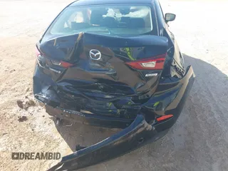 2018 Mazda 3 Sport z VIN 3MZBN1U76JM172939, wystawiony jako IAAI lot #42189372 z przebiegiem Nie podano mil oraz . Historia ofert i sprzedaży dostępna na DreamBid. Obrazek 14.
