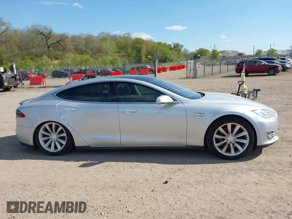 2012 Tesla Model S Performance with VIN 5YJSA1DP3CFP01348, listed as a IAAI auction lot 42185490 with 181,217 mi miles and . Bid and sale history available at DreamBid. Image 12.
