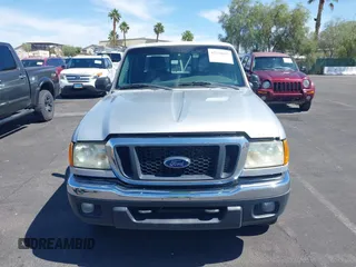 2005 Ford Ranger XLT z VIN 1FTZR45E65PA17621, wystawiony jako IAAI lot #42236835 z przebiegiem 270 409 mil mil oraz . Historia ofert i sprzedaży dostępna na DreamBid. Obrazek 6.