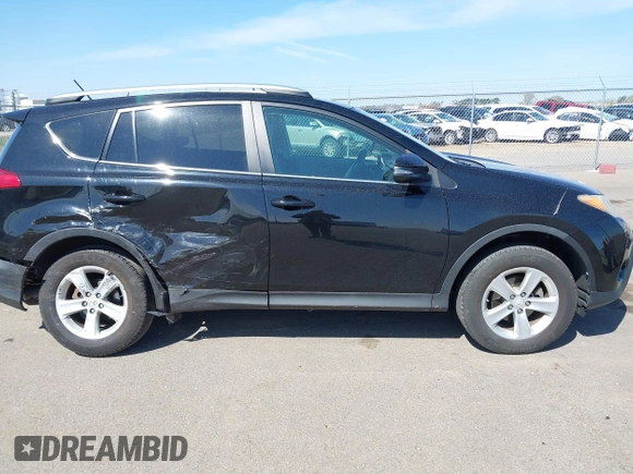 2013 Toyota RAV4 XLE with VIN 2T3WFREV0DW019201, listed as a IAAI auction lot 42145998 with 185,124 mi miles and . Bid and sale history available at DreamBid. Image 13.