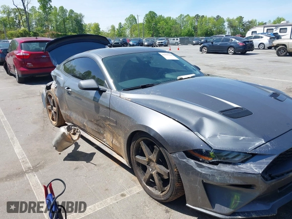 2021 Ford Mustang EcoBoost with VIN 1FA6P8TH3M5100601, listed as a IAAI auction lot 42060948 with 79,677 mi miles and . Bid and sale history available at DreamBid. Image 1.