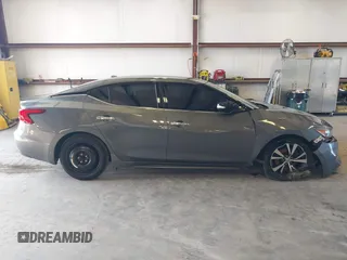 2017 Nissan Maxima SV with VIN 1N4AA6AP1HC427784, listed as a IAAI auction lot 41533604 with 111,295 mi miles and . Bid and sale history available at DreamBid. Image 13.