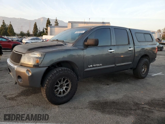 2007 Nissan Titan XE with VIN 1N6AA07A07N217705, listed as a Copart auction lot 86836804 with 272,228 mi miles and Salvage Title. Bid and sale history available at DreamBid. Image 1.