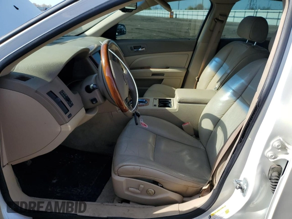 2007 Cadillac STS z VIN 1G6DW677070125177, wystawiony jako Copart lot #54316725 z przebiegiem 154 895 mil mil oraz Szkody całkowita. Historia ofert i sprzedaży dostępna na DreamBid. Obrazek 7.