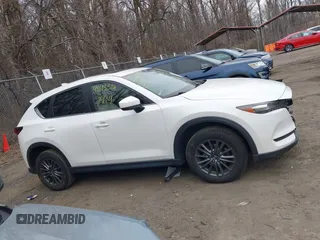 2020 Mazda CX-5 Touring with VIN JM3KFBCM5L1737640, listed as a IAAI auction lot 41613576 with 1 mi miles. Bid and sale history available at carsss.com. Image 12.