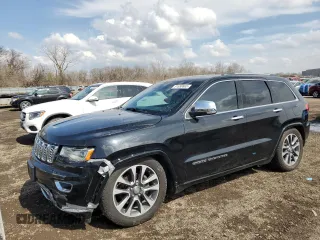2017 Jeep Grand Cherokee Overland with VIN 1C4RJFCG7HC727517, listed as a Copart auction lot 51658665 with 170,184 mi miles and Clean Title. Bid and sale history available at carsss.com. Image 1.