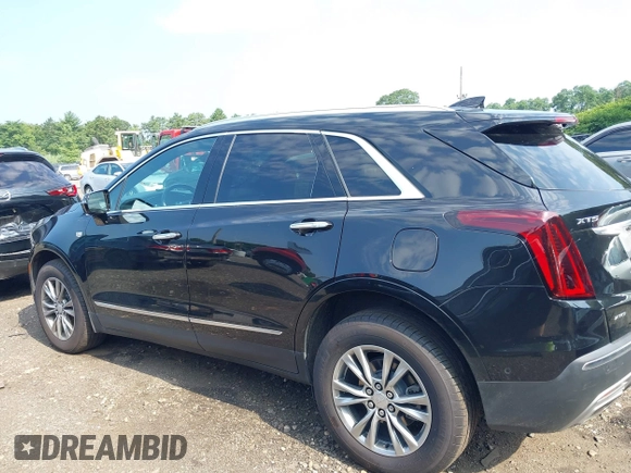 2022 Cadillac XT5 AWD Premium Luxury with VIN 1GYKNDRS9NZ153897, listed as a IAAI auction lot 39837633 with 81,342 mi miles and . Bid and sale history available at DreamBid. Image 14.