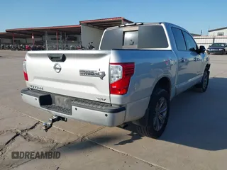 2018 Nissan Titan SV with VIN 1N6AA1E62JN502207, listed as a IAAI auction lot 41996558 with 133,051 mi miles and . Bid and sale history available at DreamBid. Image 4.