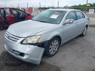 2007 Toyota Avalon XL with VIN 4T1BK36B47U191188, listed as a IAAI auction lot 42127335 with 213,701 mi miles. Bid and sale history available at carsss.com. Image 6.