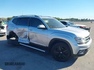 2019 Volkswagen Atlas SEL z VIN 1V2ER2CA8KC574020, wystawiony jako IAAI lot #41279317 z przebiegiem 74 520 mil mil oraz . Historia ofert i sprzedaży dostępna na DreamBid. Obrazek 1.