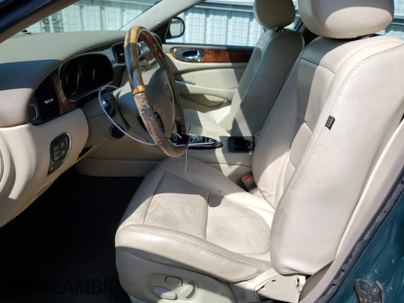 2004 Jaguar XJ with VIN SAJWA71C34SG16508, listed as a Copart auction lot 66751644 with 179,039 mi miles and Salvage Title. Bid and sale history available at carsss.com. Image 7.