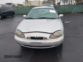 1997 Mercury Sable GS z VIN 1MELM50U8VG603194, wystawiony jako IAAI lot #41558010 z przebiegiem 265 169 mil mil oraz . Historia ofert i sprzedaży dostępna na DreamBid. Obrazek 6.