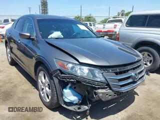 2012 Honda Crosstour EX-L z VIN 5J6TF2H5XCL012127, wystawiony jako IAAI lot #42149456 z przebiegiem 163 946 mil mil oraz . Historia ofert i sprzedaży dostępna na DreamBid. Obrazek 1.