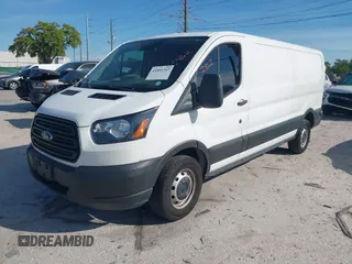 2019 Ford Transit z VIN 1FTYR2ZM1KKB25574, wystawiony jako IAAI lot #41891247 z przebiegiem 142 627 mil mil oraz . Historia ofert i sprzedaży dostępna na DreamBid. Obrazek 17.