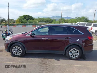 2019 Kia Sorento LX z VIN 5XYPG4A58KG565461, wystawiony jako IAAI lot #42099618 z przebiegiem 42 574 mil mil oraz . Historia ofert i sprzedaży dostępna na DreamBid. Obrazek 14.