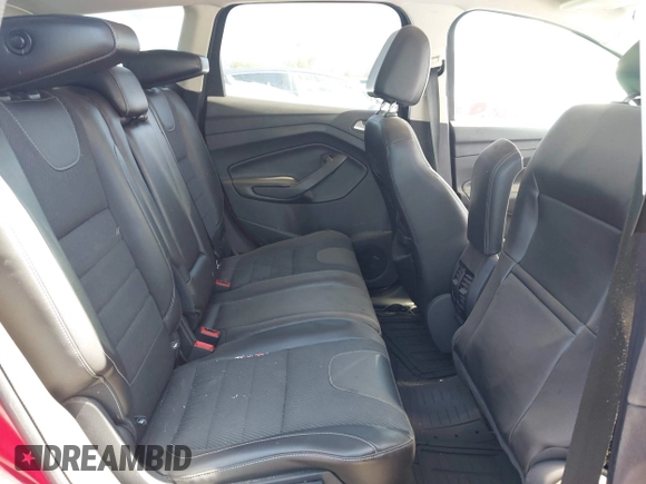 2013 Ford Escape Titanium with VIN 1FMCU0J96DUA57425, listed as a IAAI auction lot 40458653 with 121,929 mi miles. Bid and sale history available at carsss.com. Image 8.