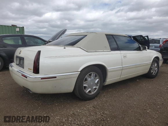 2002 Cadillac Eldorado ESC with VIN 1G6EL12Y52B103303, listed as a Copart auction lot 53337965 with 98,007 mi miles and Clean Title. Bid and sale history available at DreamBid. Image 3.
