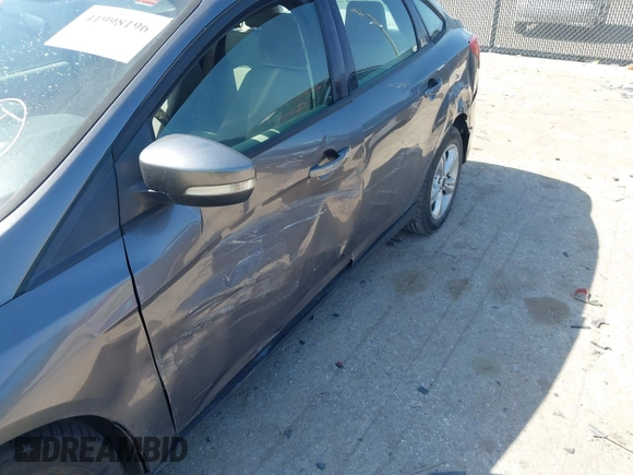 2013 Ford Focus SE with VIN 1FADP3F27DL156733, listed as a IAAI auction lot 41998196 with 116,692 mi miles. Bid and sale history available at carsss.com. Image 6.