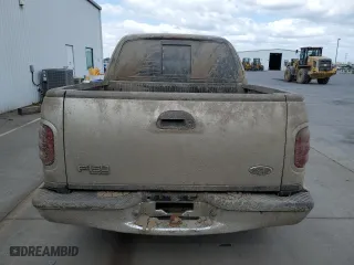 2001 Ford F-150 SuperCrew XLT with VIN 1FTRW07W01KA40634, listed as a Copart auction lot 71674184 with 0 mi miles and Salvage Title. Bid and sale history available at carsss.com. Image 6.