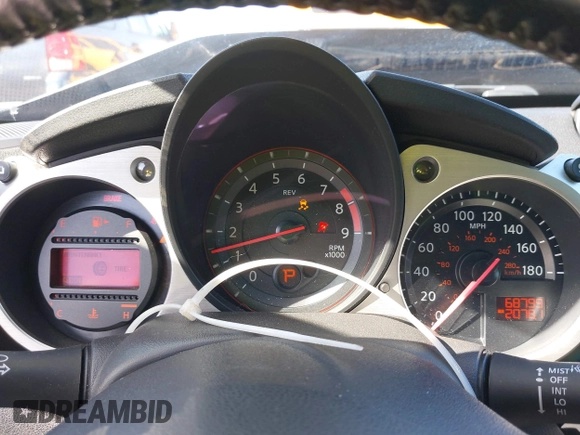 2014 Nissan 370Z Touring with VIN JN1AZ4FH8EM620208, listed as a IAAI auction lot 42094292 with 68,799 mi miles and . Bid and sale history available at DreamBid. Image 7.