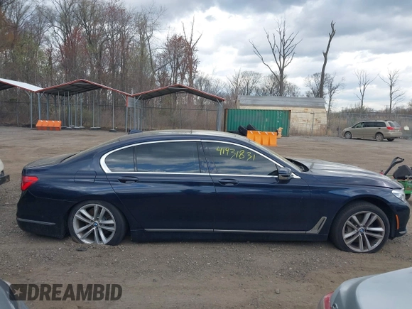 2016 BMW 7 Series 750i xDrive with VIN WBA7F2C58GG418482, listed as a IAAI auction lot 41931831 with 97,776 mi miles and . Bid and sale history available at DreamBid. Image 12.