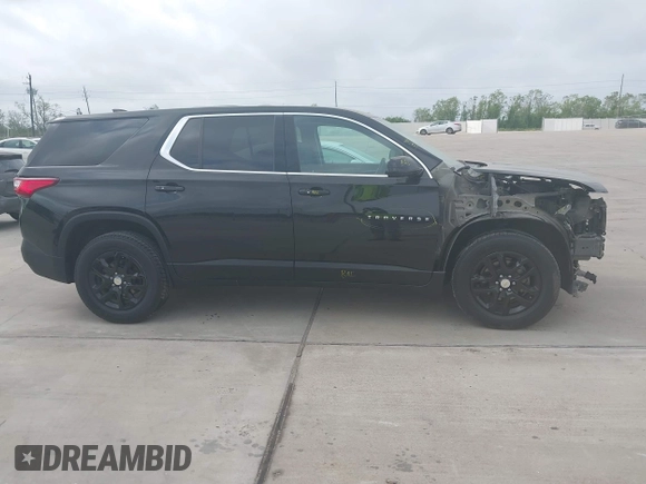2019 Chevrolet Traverse LS z VIN 1GNERFKW7KJ196992, wystawiony jako IAAI lot #41947512 z przebiegiem 118 863 mil mil oraz . Historia ofert i sprzedaży dostępna na DreamBid. Obrazek 13.