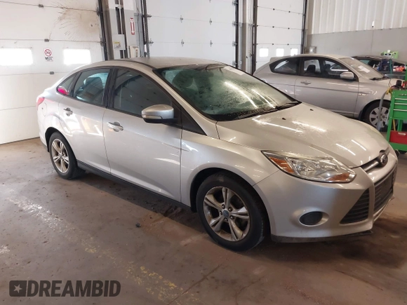 2013 Ford Focus SE z VIN 1FADP3F24DL277767, wystawiony jako IAAI lot #41562390 z przebiegiem 183 322 mil mil oraz . Historia ofert i sprzedaży dostępna na DreamBid. Obrazek 1.