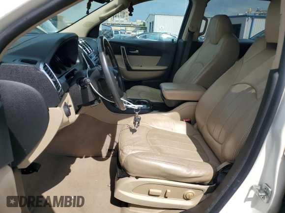 2012 GMC Acadia Denali with VIN 1GKKVTED7CJ335248, listed as a Copart auction lot 69451384 with 124,641 mi miles and Salvage Title. Bid and sale history available at carsss.com. Image 7.
