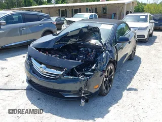 2018 Buick Cascada Sport Touring z VIN W04WJ3N5XJG085431, wystawiony jako IAAI lot #42129756 z przebiegiem 24 364 mil mil oraz . Historia ofert i sprzedaży dostępna na DreamBid. Obrazek 6.